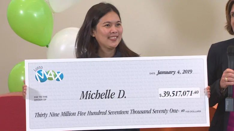 Lotto Max Winner Cheque : Wife Grandmother Picks Up 50 ...